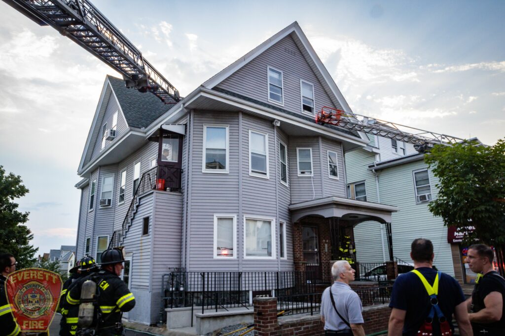 Everett Firefighters ladder being used in a house on fire